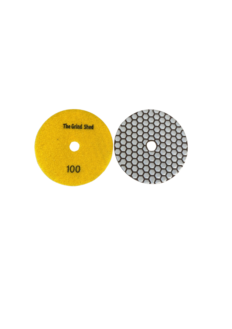 The Grind Shed's 100 Grit Honeycomb Diamond Polishing Pad refines the surface after coarse grinding, closing scratches while beginning to smooth the floor.