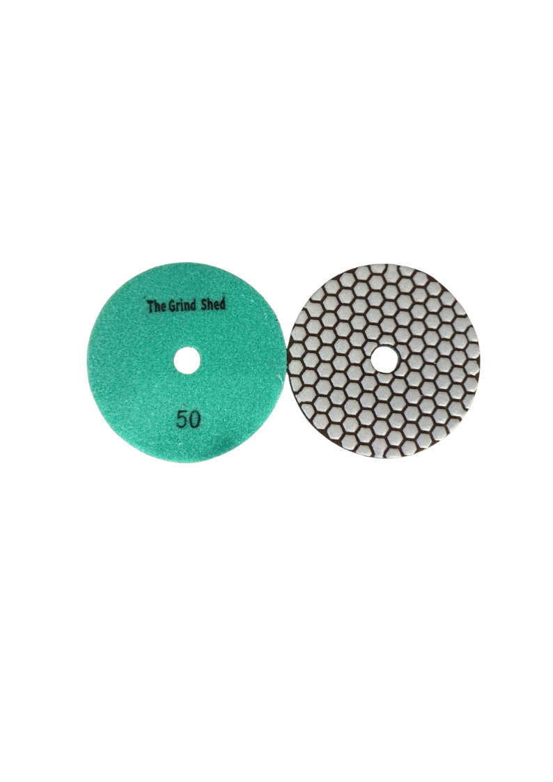 The Grind Shed's 50 Grit Honeycomb Diamond Polishing Pad refines the surface after coarse grinding, closing scratches while beginning to smooth the floor.