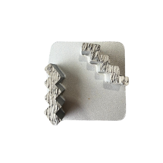 The Grind Shed's Double Reaper 30 grit Super Soft bond segment is built to cut fast and stay sharp. Featuring dual zig-zag segments, this tool delivers aggressive stock removal with excellent stability and control. The Medium bond ensures longer life when grinding slabs, adhesives, or coatings.